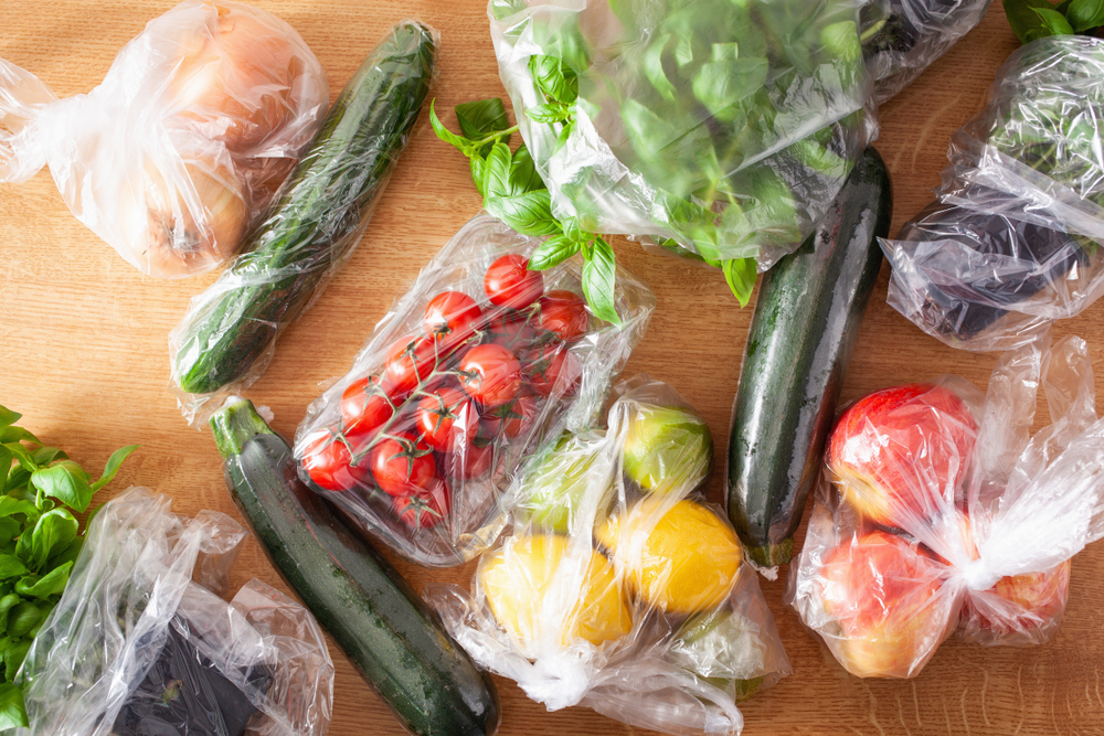 Fruits and vegetables in plastic bags